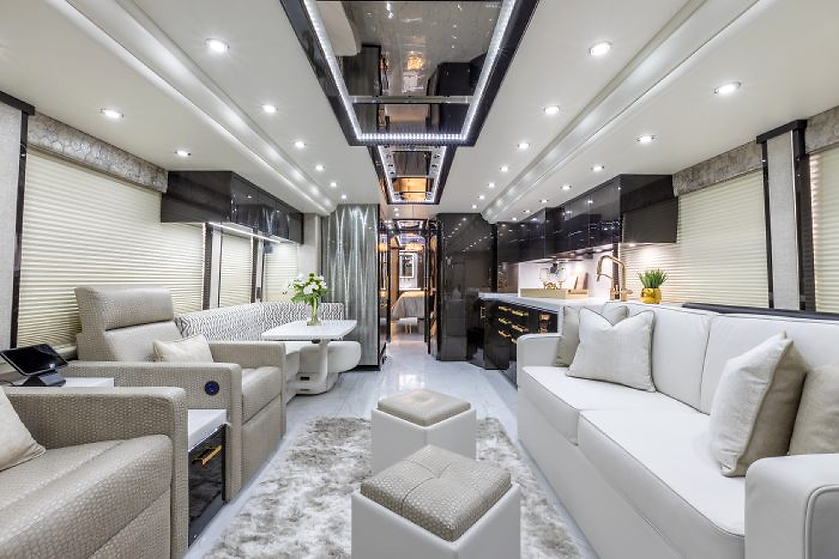 Prevost intimate lounge with projection screen