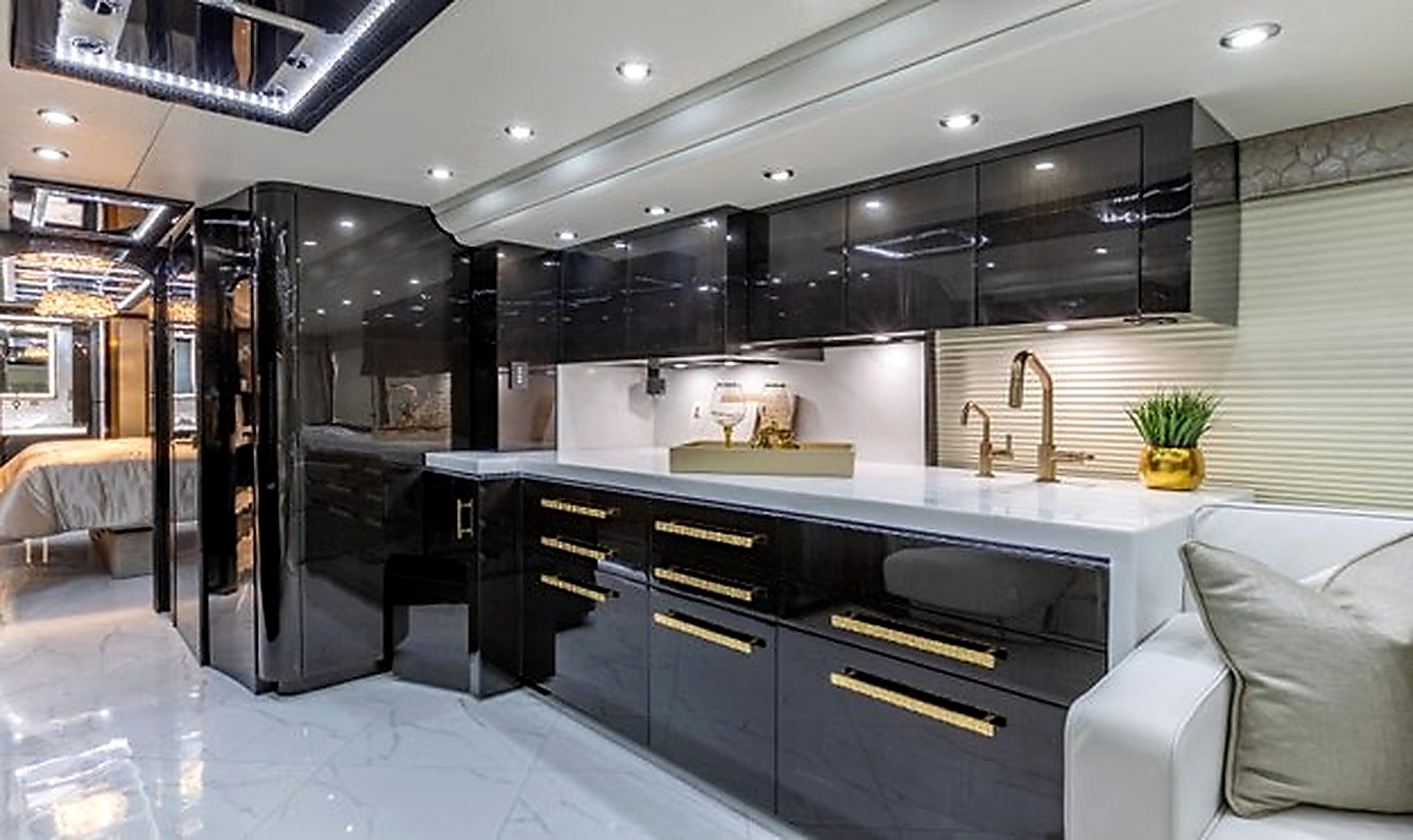 Prevost galley kitchen with gold fixtures