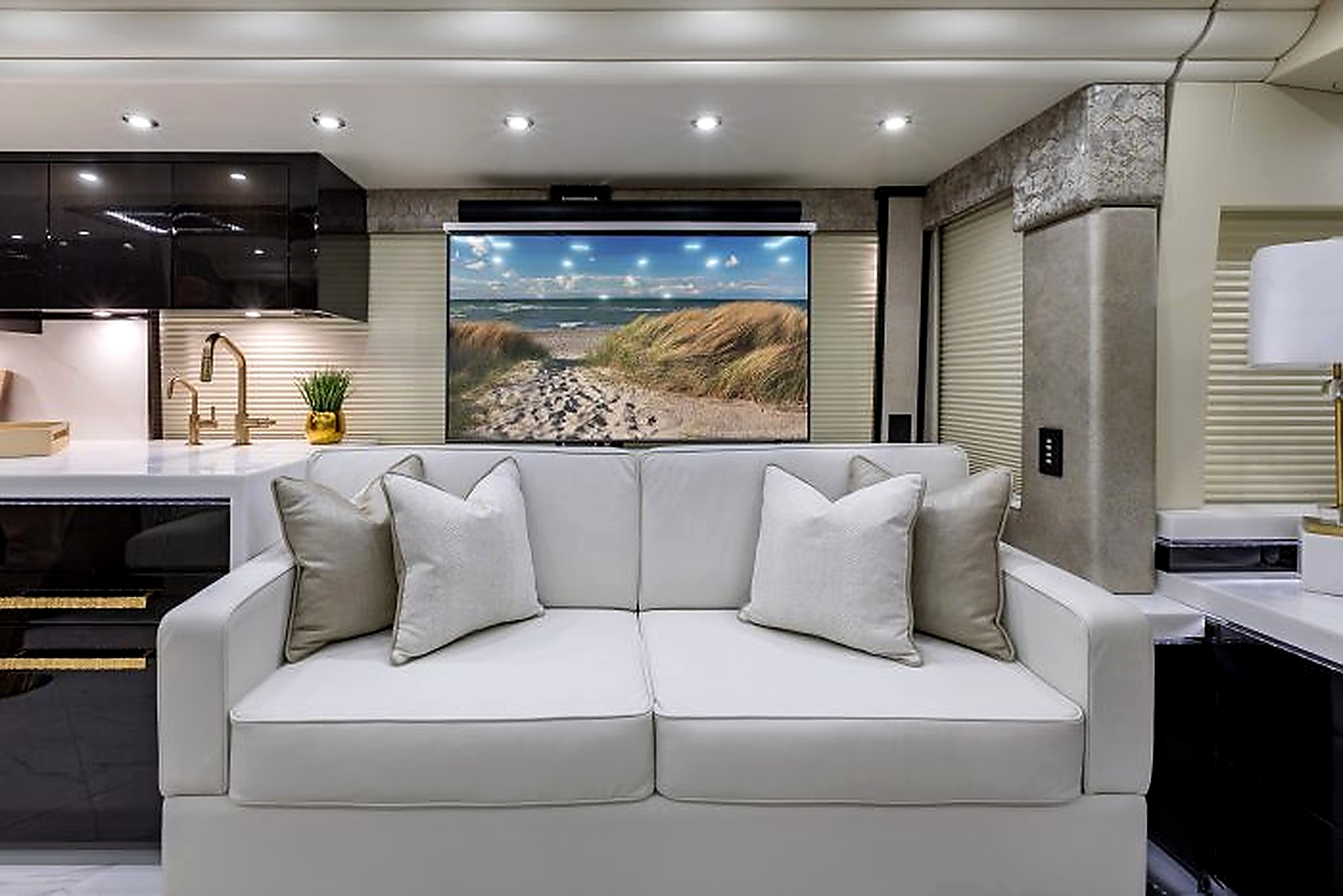 Prevost lounge with dual projection screens